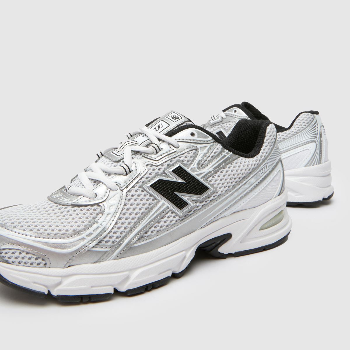 New Balance  740 in White & Silver New Balance  740 in White & Silver