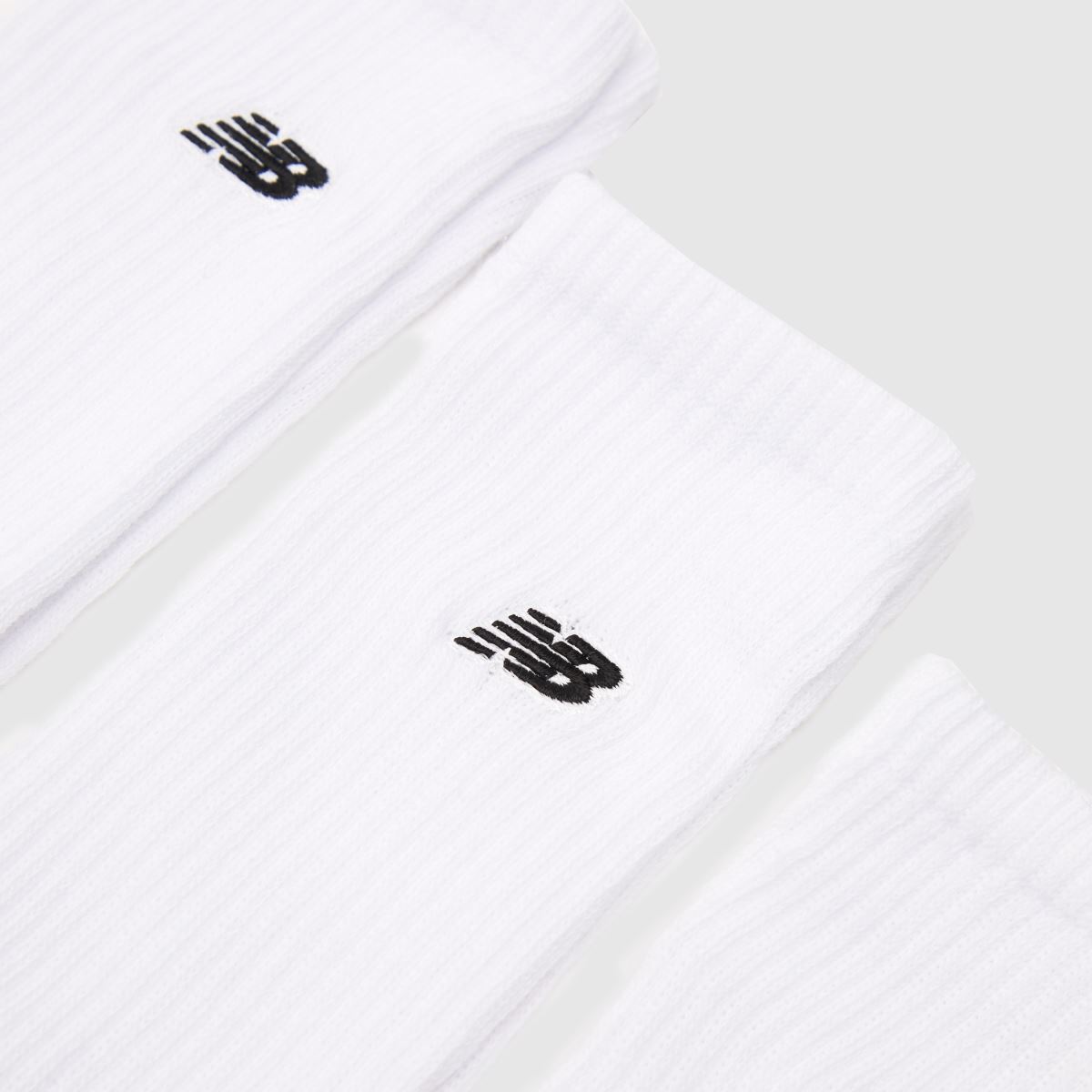 New Balance  Patch Logo Crew Socks 3 Pack in White New Balance  Patch Logo Crew Socks 3 Pack in White