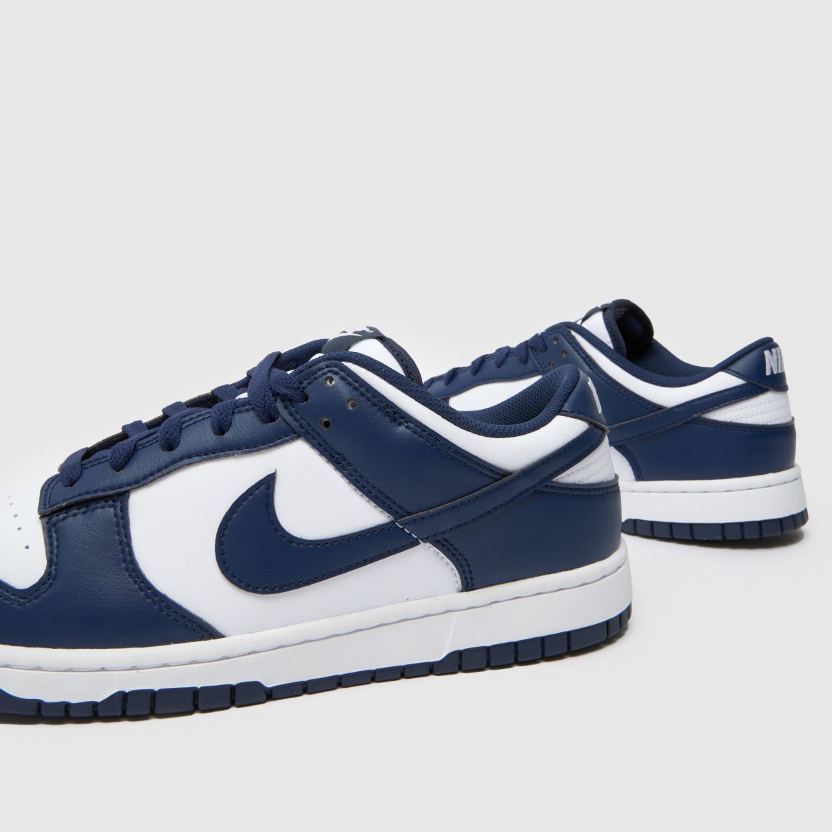 Nike  Dunk Low in White & Navy Nike  Dunk Low in White & Navy