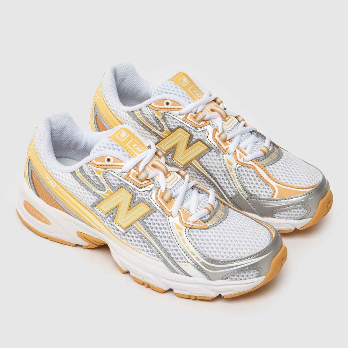 New Balance  740 in White & Yellow New Balance  740 in White & Yellow