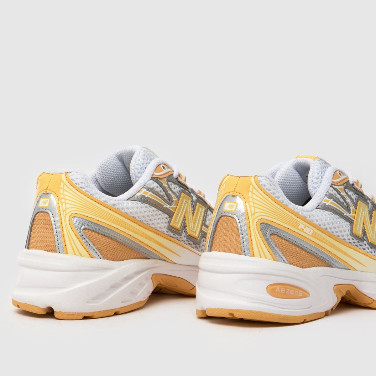 New Balance  740 in White & Yellow New Balance  740 in White & Yellow