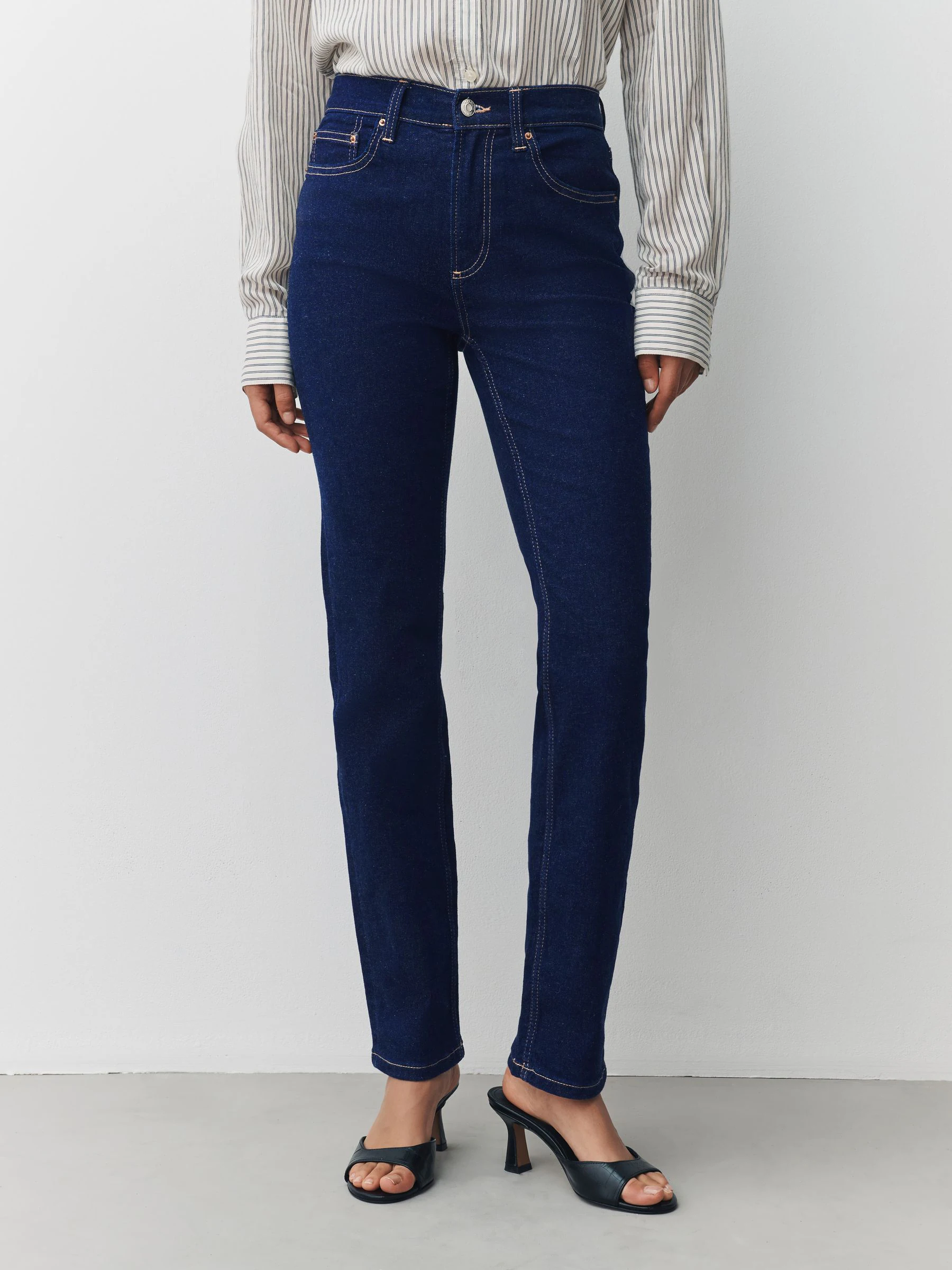 Rinse Blue Slim Mid Rise Stretch Jeans
