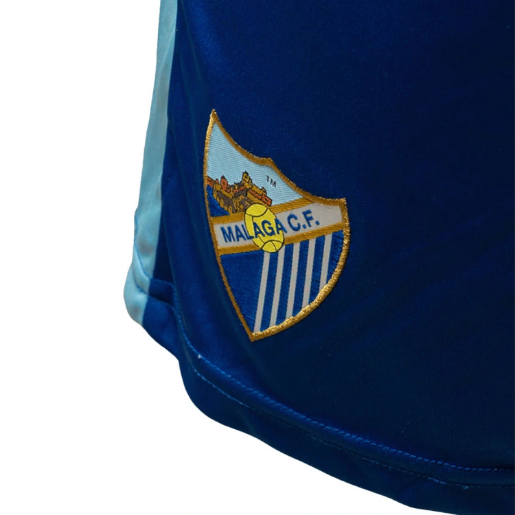 Pantalón corto Hummel Malaga Cf Primera Equipación 2025-2026